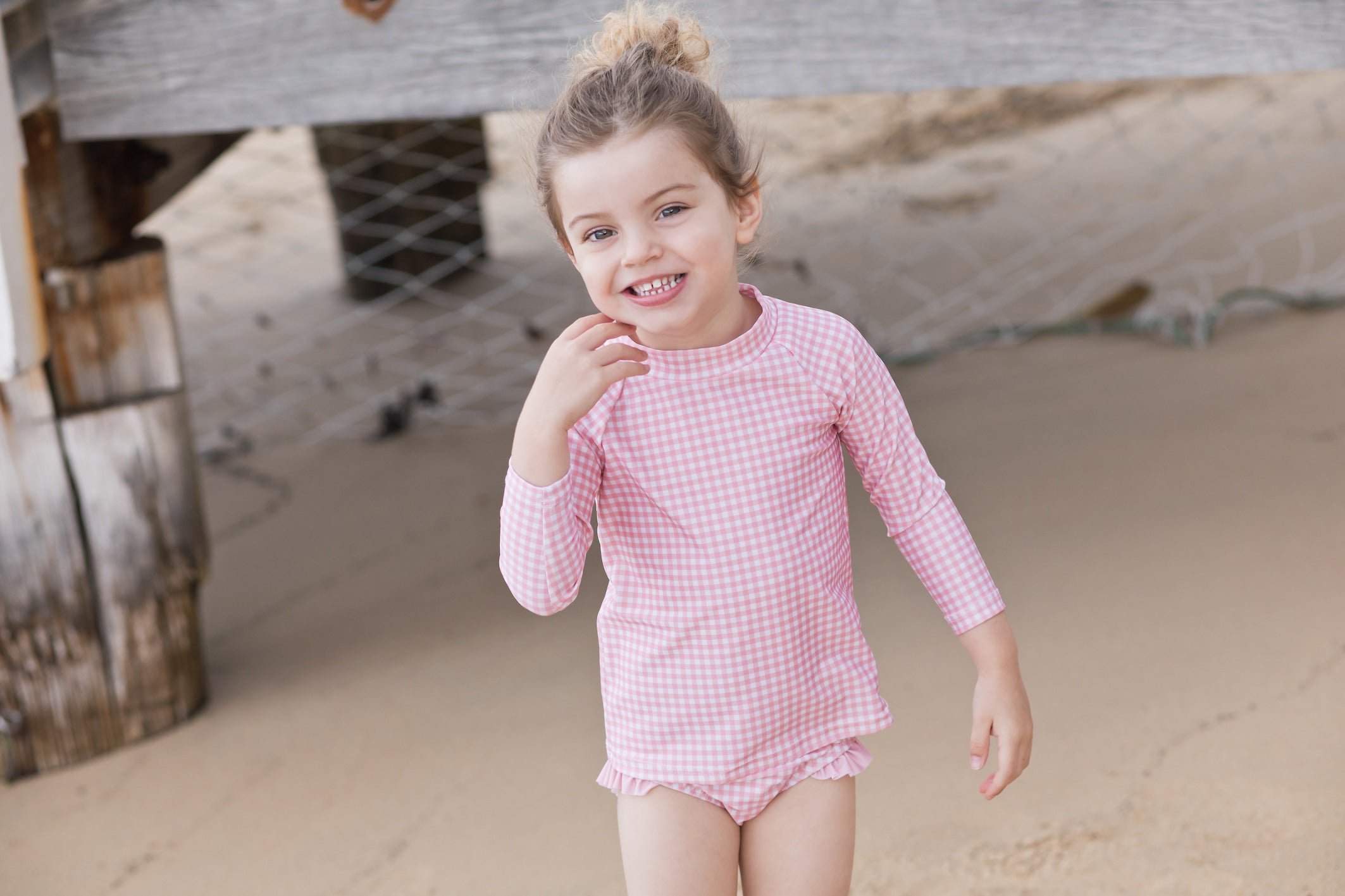 pambula pink gingham long sleeve rashguard