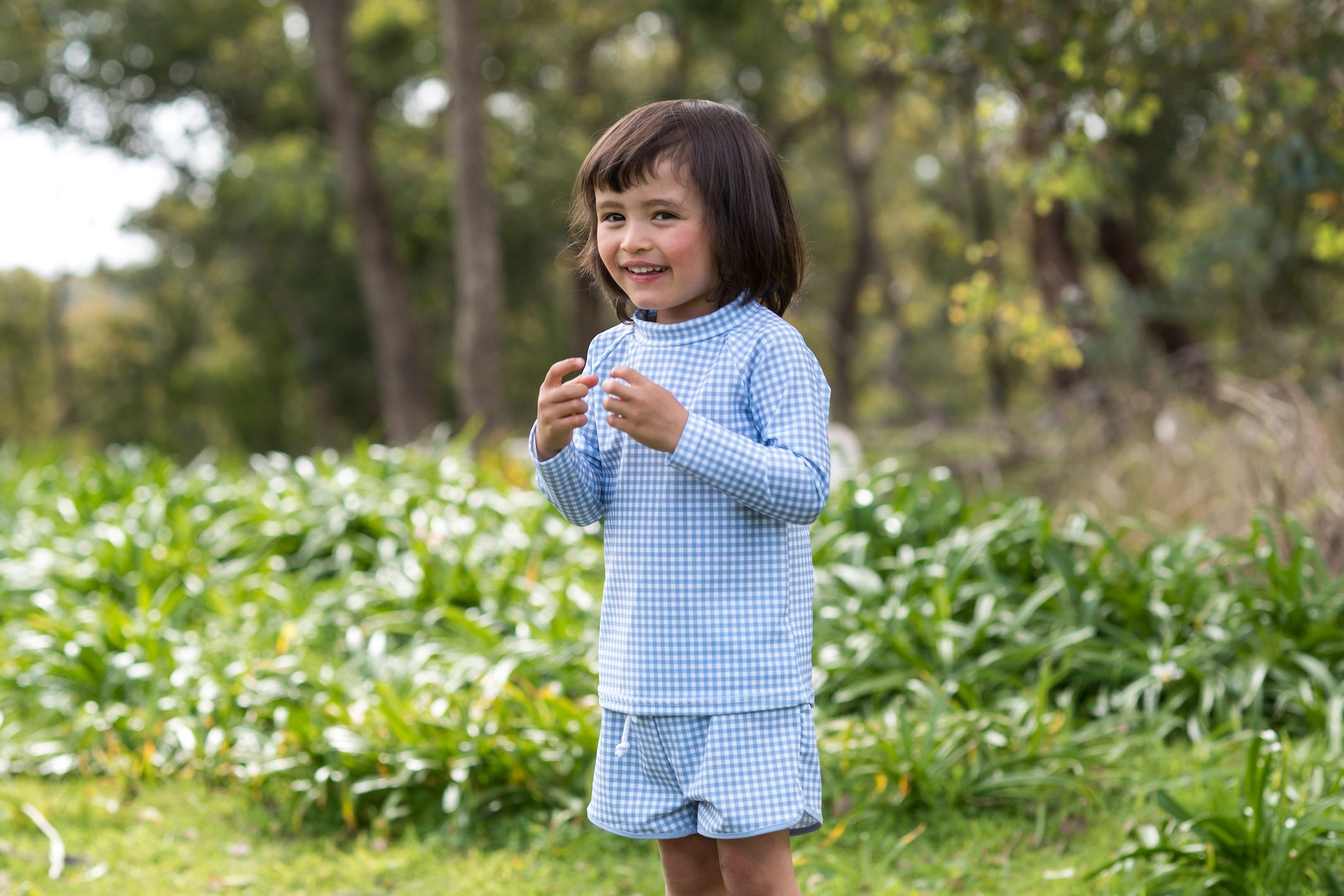 bells blue gingham long sleeve rashguard
